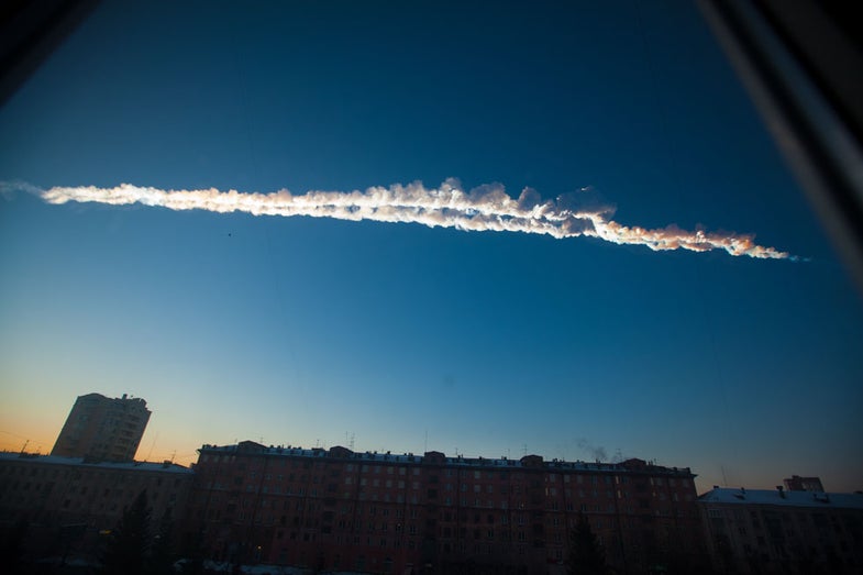 In this photo provided by Chelyabinsk.ru a meteorite contrail is seen over Chelyabinsk on Friday, Feb. 15, 2013. A meteor streaked across the sky of Russia’s Ural Mountains on Friday morning, causing sharp explosions and reportedly injuring around 100 people, including many hurt by broken glass. (AP Photo/Chelyabinsk.ru)