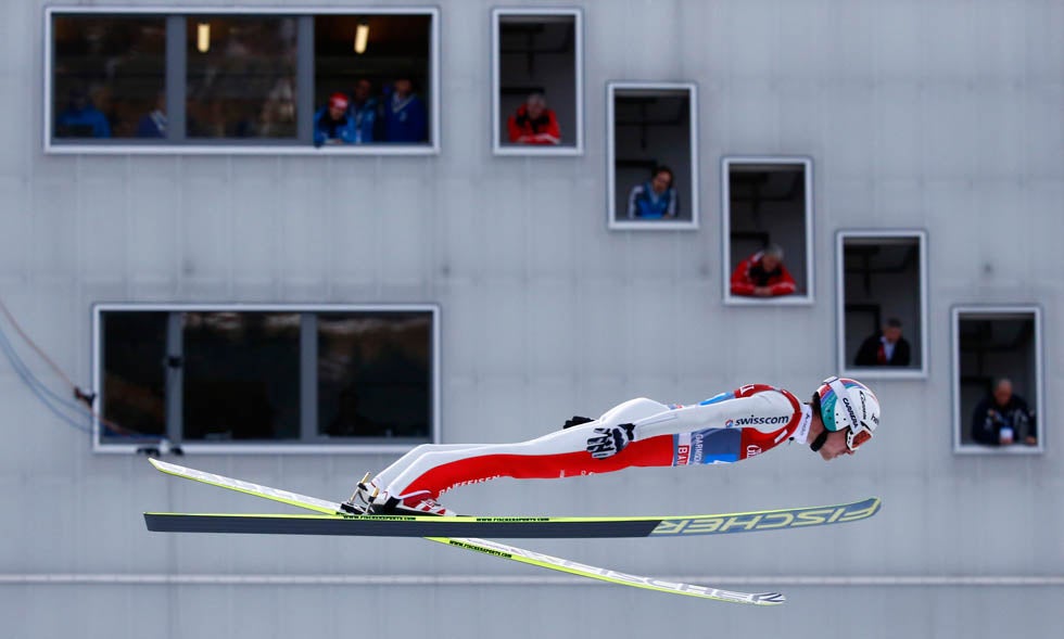 Switzerland's Simon Ammann soars past the judges tower during the second jumping of the 61st four-hills ski jumping tournament in Garmisch-Partenkirchen, southern Germany. Kai Pfaffenbach is a Germany-born photojournalist, who began working for Reuters in 1996, before coming on fulltime in 2001. See more of his work on his <a href="http://www.kai-oliver-pfaffenbach.com/">Website</a>. You can also keep up to date with his assignments by checking out his <a href="http://blogs.reuters.com/kai-pfaffenbach/">Reuters blog</a>.