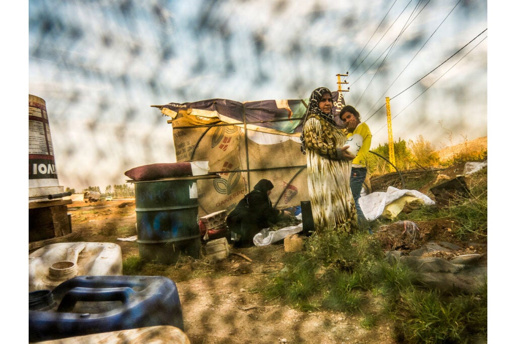 "The fence and the people are woven together into one fabric. Fences are the fabric of our lives."