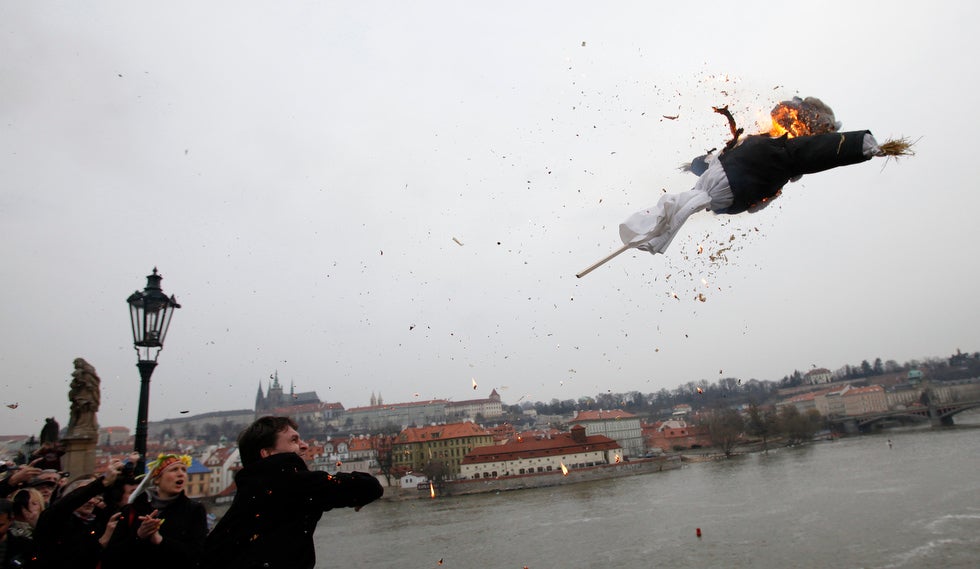 A man throws a burning effigy depicting outgoing Czech President Vaclav Klaus from the medieval Charles Bridge during a rally celebrating the end of Klaus' presidency. David W Cerny is a Reuters staffer based in the Czech republic. See more of his work <a href="http://davidwcerny.com/">here</a>.