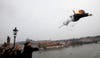 A man throws a burning effigy depicting outgoing Czech President Vaclav Klaus from the medieval Charles Bridge during a rally celebrating the end of Klaus' presidency. David W Cerny is a Reuters staffer based in the Czech republic. See more of his work <a href="http://davidwcerny.com/">here</a>.