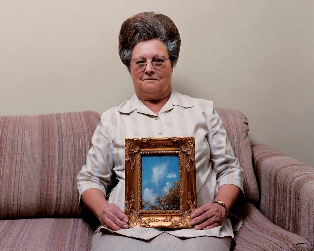 Bonnie (with a photograph of an angel), Port Gibson, Mississippi 2000