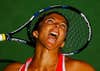 Sara Errani of Italy serves to Samantha Stosur of Australia during their Women's Singles Third Round match on Day Six of the 2015 US Open at the USTA Billie Jean King National Tennis Center on September 5, 2015 in the Flushing neighborhood of the Queens borough of New York City.