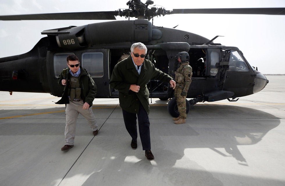 U.S. Defense Secretary Chuck Hagel steps off a military helicopter after arriving at Bagram Air Field in Kabul, Afghanistan. The trip was Hagel's first since being sworn-in as U.S. President Barack Obama's Defense Secretary. Jason Reed is a Reuters staffer who primarily covers President Barack Obama and his cabinet members. See more of his work <a href="http://www.americanphotomag.com/photo-gallery/2012/09/photojournalism-week-september-28-2012?page=4">here</a> and <a href="http://www.americanphotomag.com/photo-gallery/2013/02/photojournalism-week-february-15-2013?page=10">here</a>.