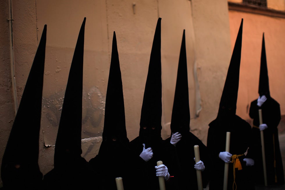 Penitents take part in the Vineros brotherhood procession in Malaga, southern Spain. The procession is a part of Holy Week, which is celebrated in many Christian traditions during the week before Easter. Jon Nazca is a Reuters staffer based in Spain, see more of his work <a href="http://www.americanphotomag.com/photo-gallery/2013/02/photojournalism-week-february-15-2013?page=7">here</a>.