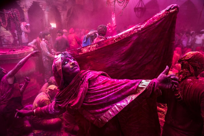 A transgender Hindu devotee dances during Lathmaar Holi celebrations on March 21, 2013 near Mathura, India.