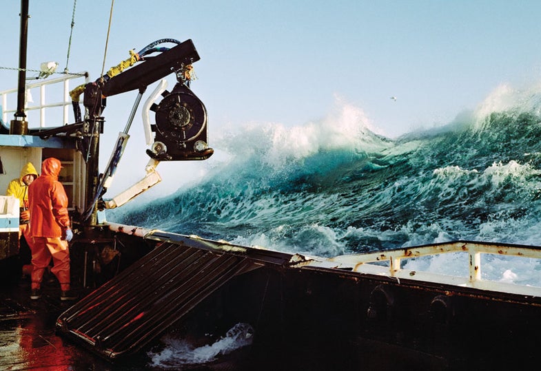 King crab fishermen aboard the f/v Rollo facing rough weather in the Bering Sea, Alaska APH1013_On_The_Job