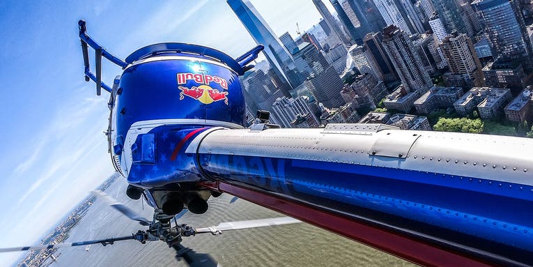 Daring photos of the Red Bull aerobatic helicopter over the New York harbor