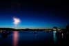 Fireworks over the lake at night