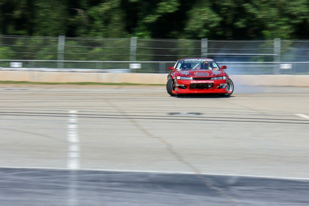 racecar drifting on track