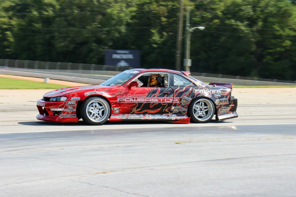 racecar drifting on track