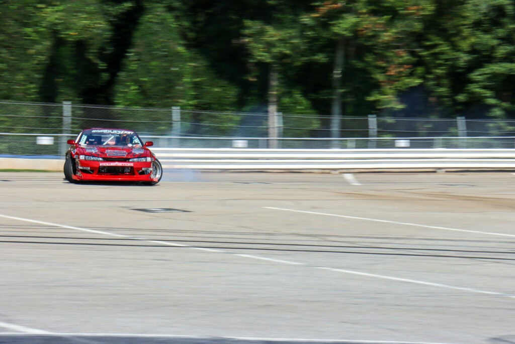 racecar drifting on track