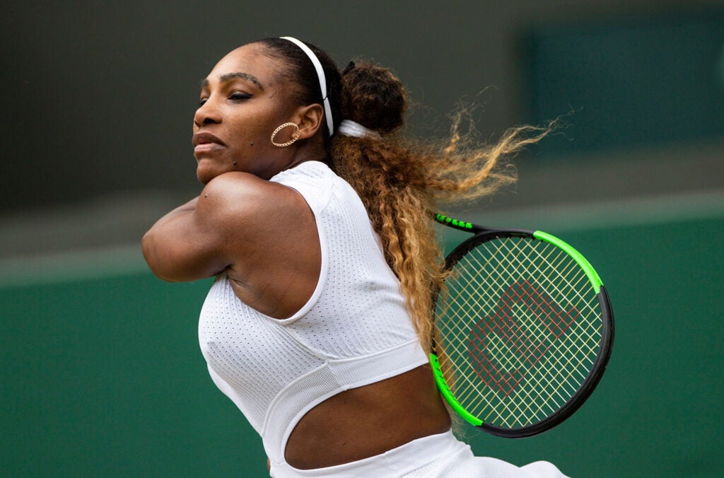 Serena Williams swinging at Wimbledon Tennis Championships