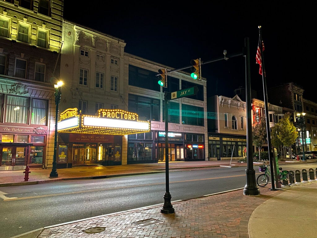 A theater sign at night