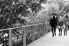 3 girls walking on bridge