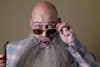 bald man with sunglasses and grey beard