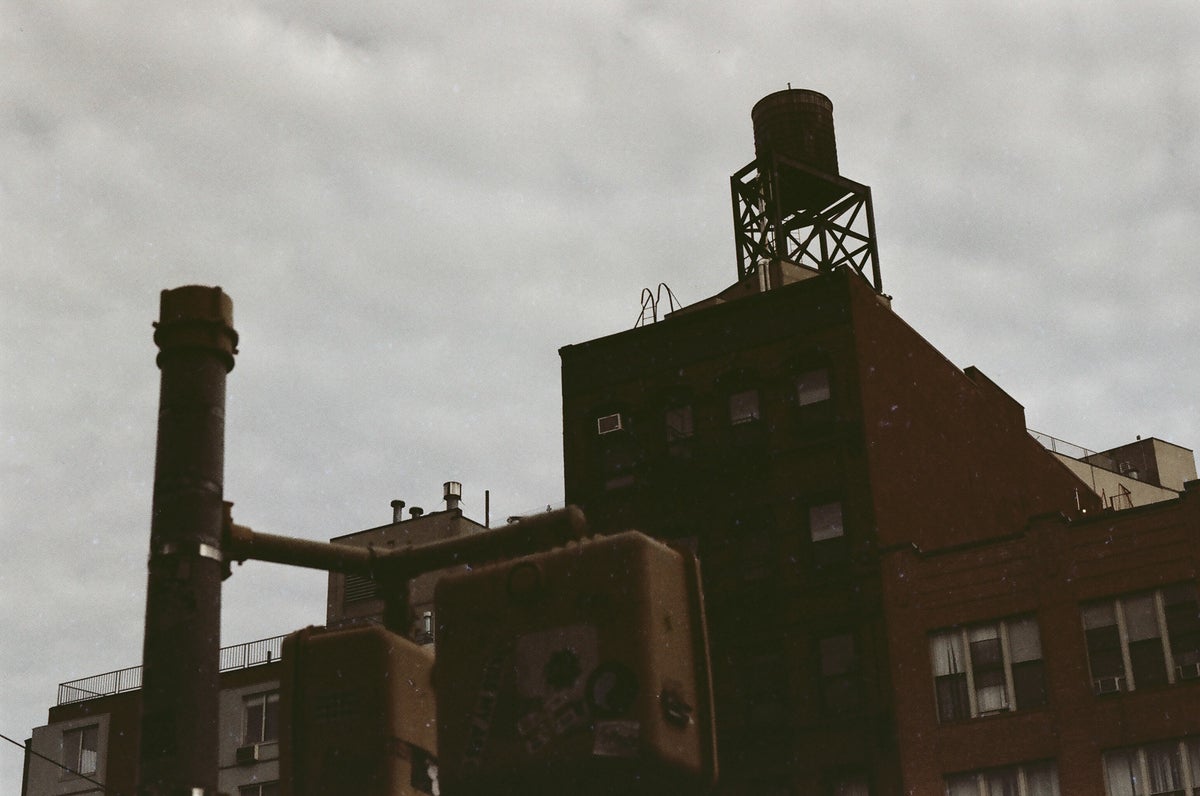 Watertower against a muted sky in New York.