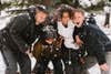 People laughing in the snow