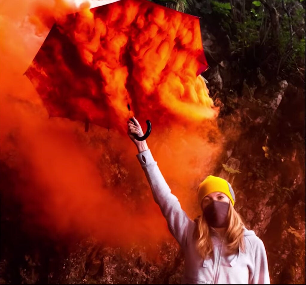 Photograph using a smoke bomb under an umbrella