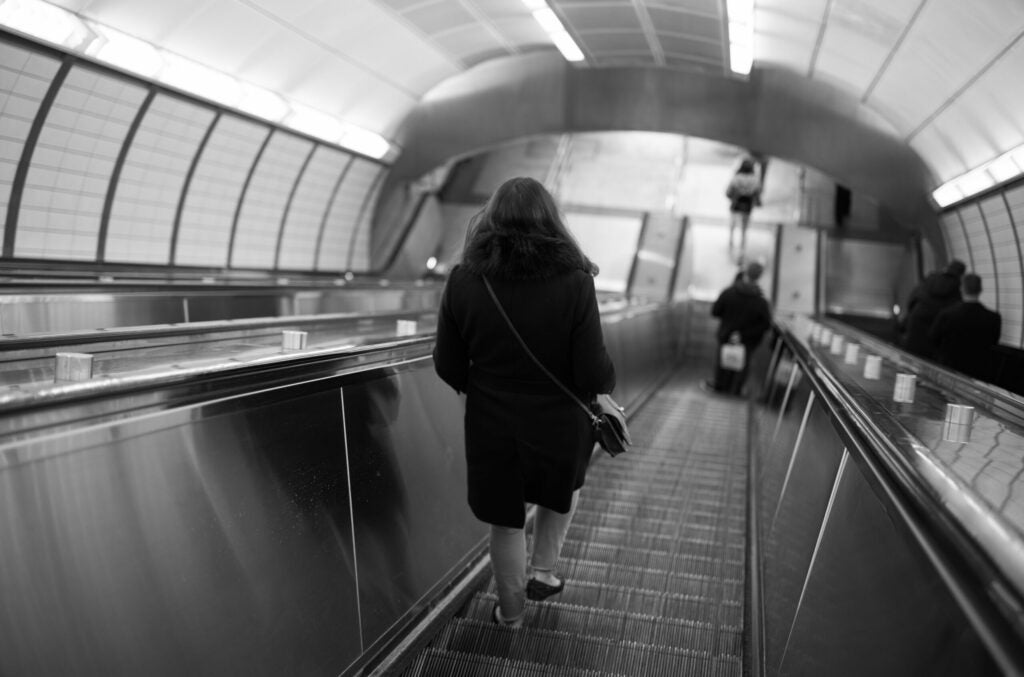 Lone commuter heads toward the 7 train