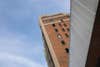 Tall brick building from below