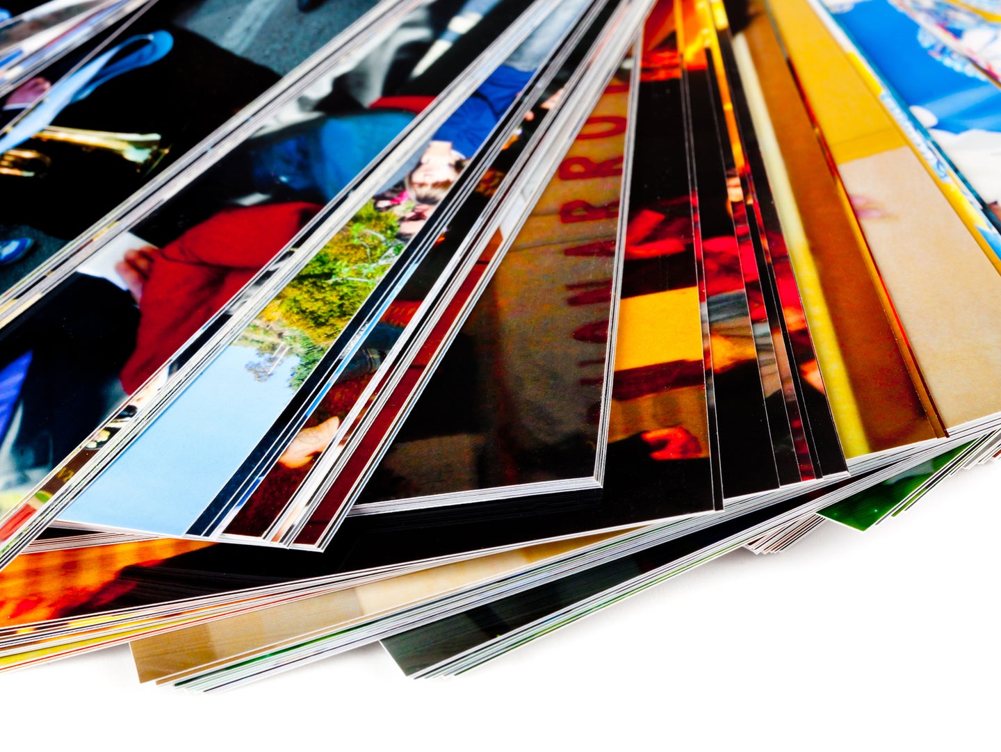 Stack of the photos, isolated on a white background.