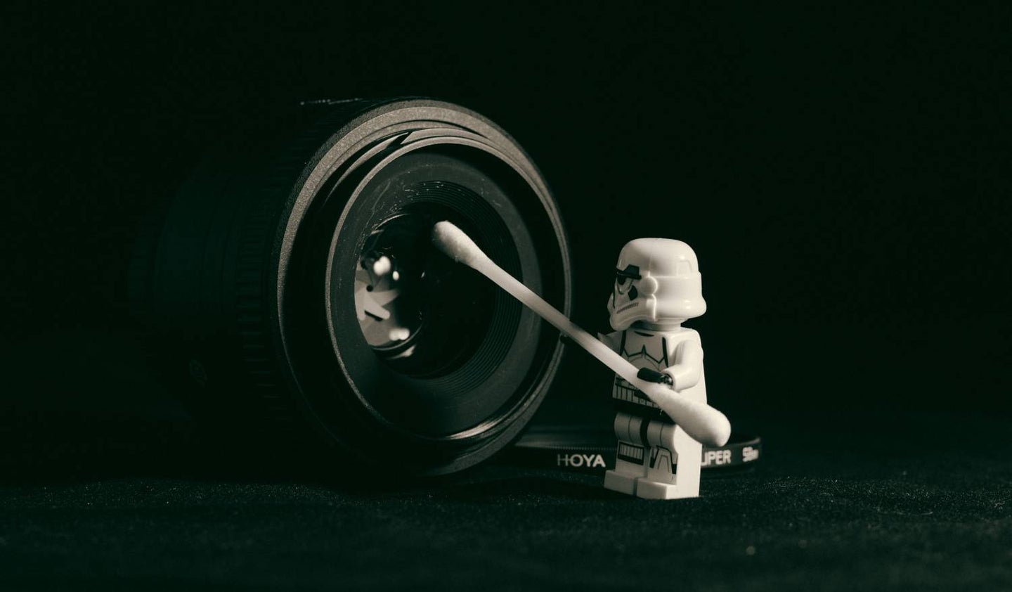 Star Wars Lego figurine cleaning camera lens