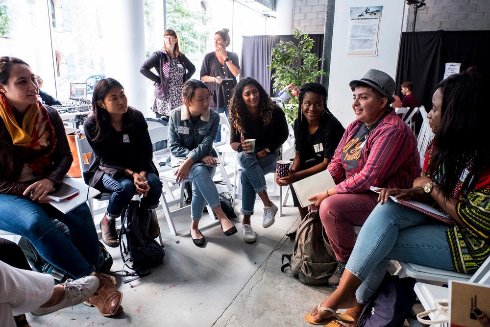 Group of women talking in a circle