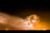 A lightning-filled cloud looms over the city lights of Burlington, Colorado. May 20, 2014.