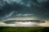 A supercell with sides sculpted by updraft winds hovers over Circle, Montana. June 9, 2016.