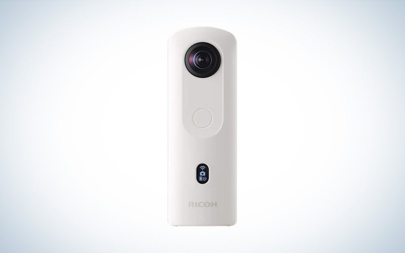 a white Ricoh Theta SC2 360 camera