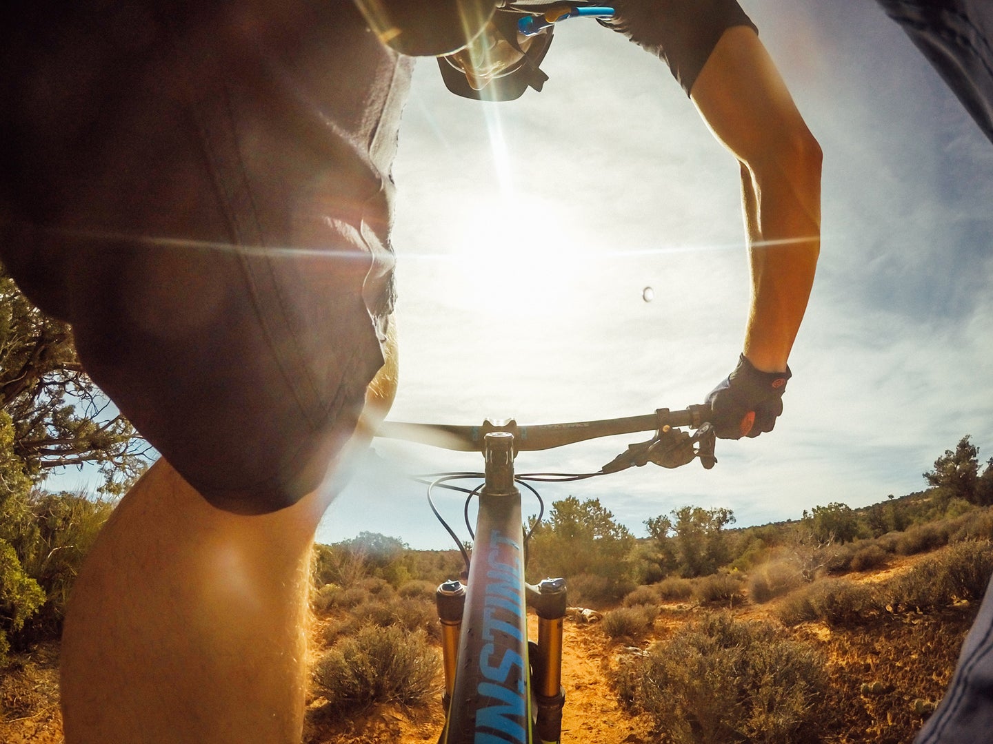 guy riding a bike on a mountain