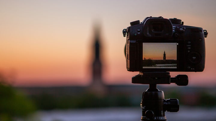 camera on a tripod facing a sunset using the best micro SD card