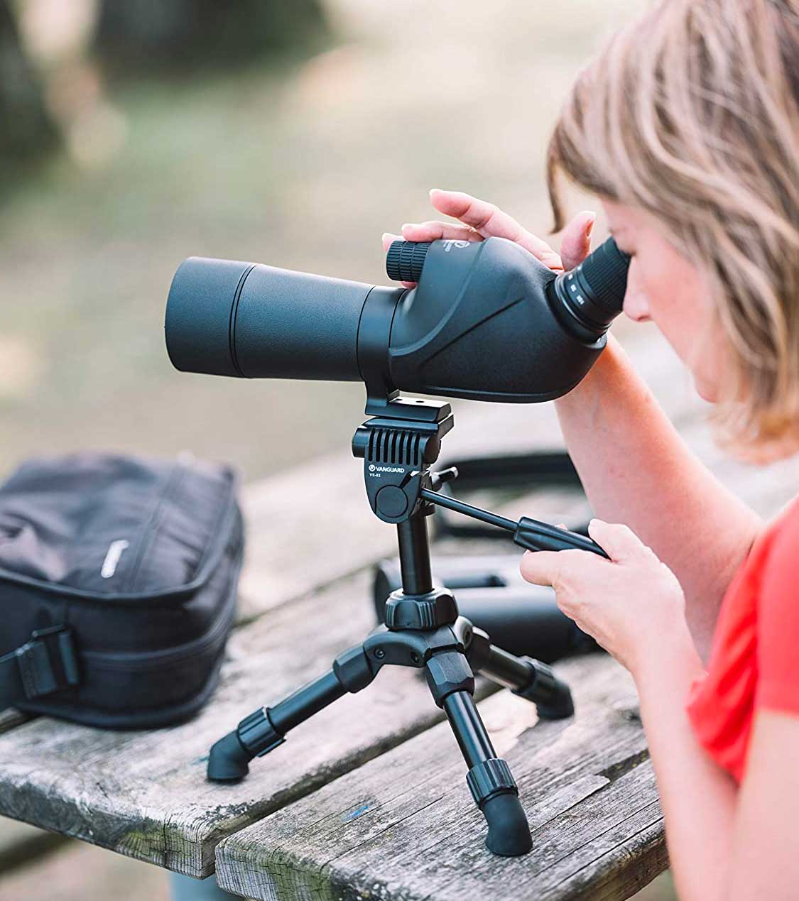 Woman using a tripod