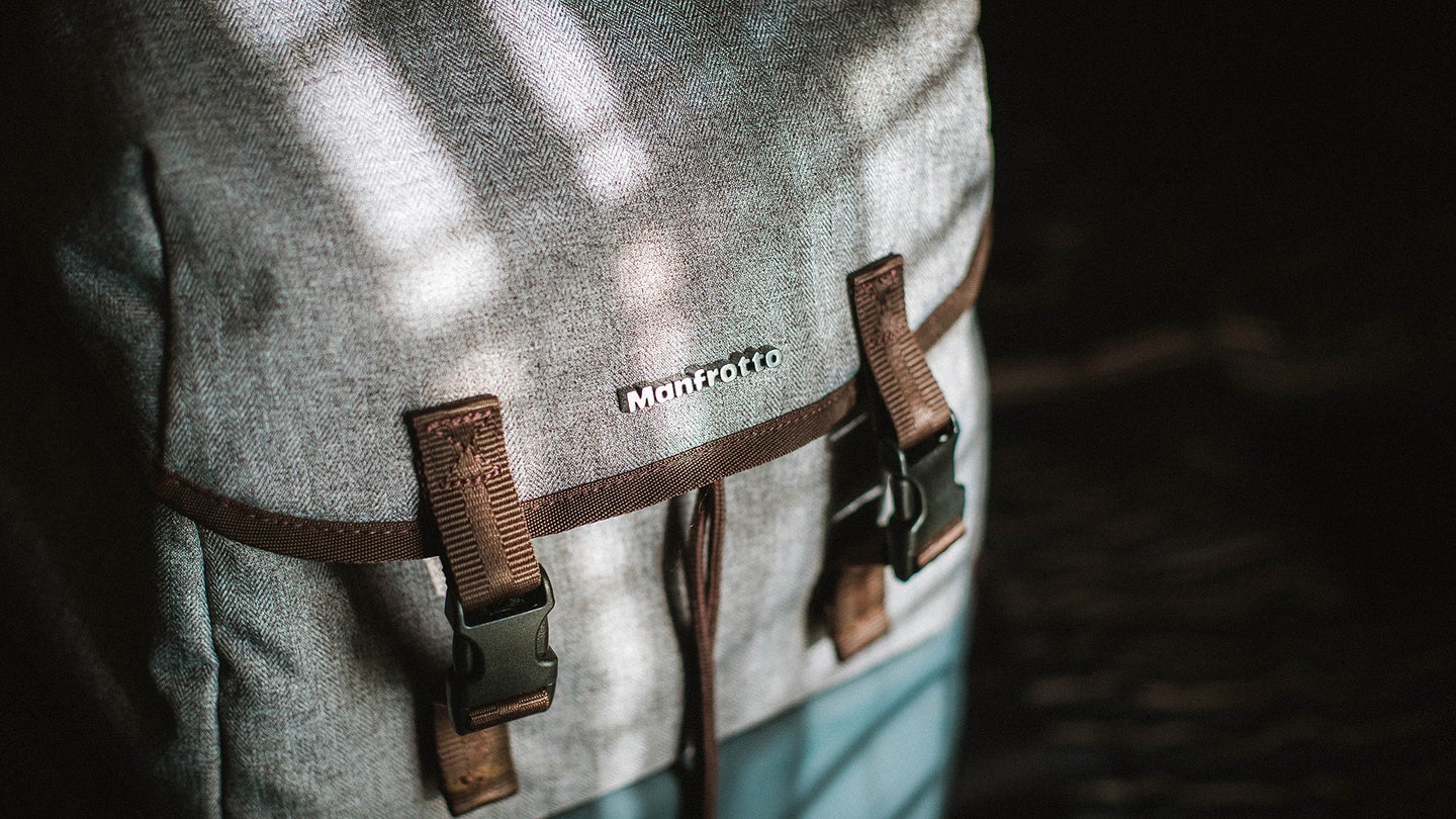 brown, grey, and blue Manfrotto bag with straps is one of the best camera bags
