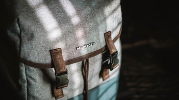 brown, grey, and blue Manfrotto bag with straps is one of the best camera bags
