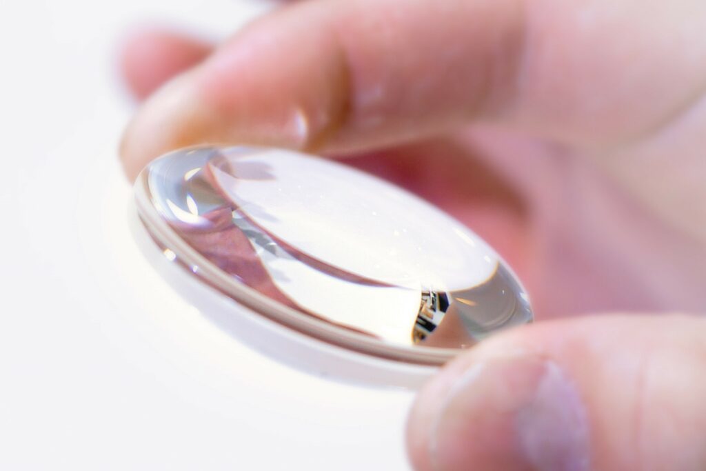 Sony's extreme aspherical lens element in someone's hand