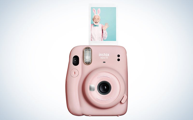 pink fujifilm instax camera with a print for Mother's Day