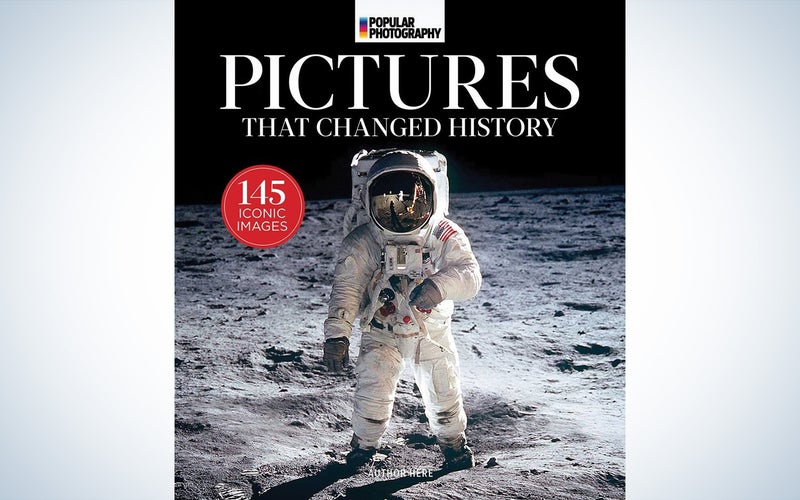 The cover of a photography book titled Popular Photography: The Worldâs Most Iconic Photographs