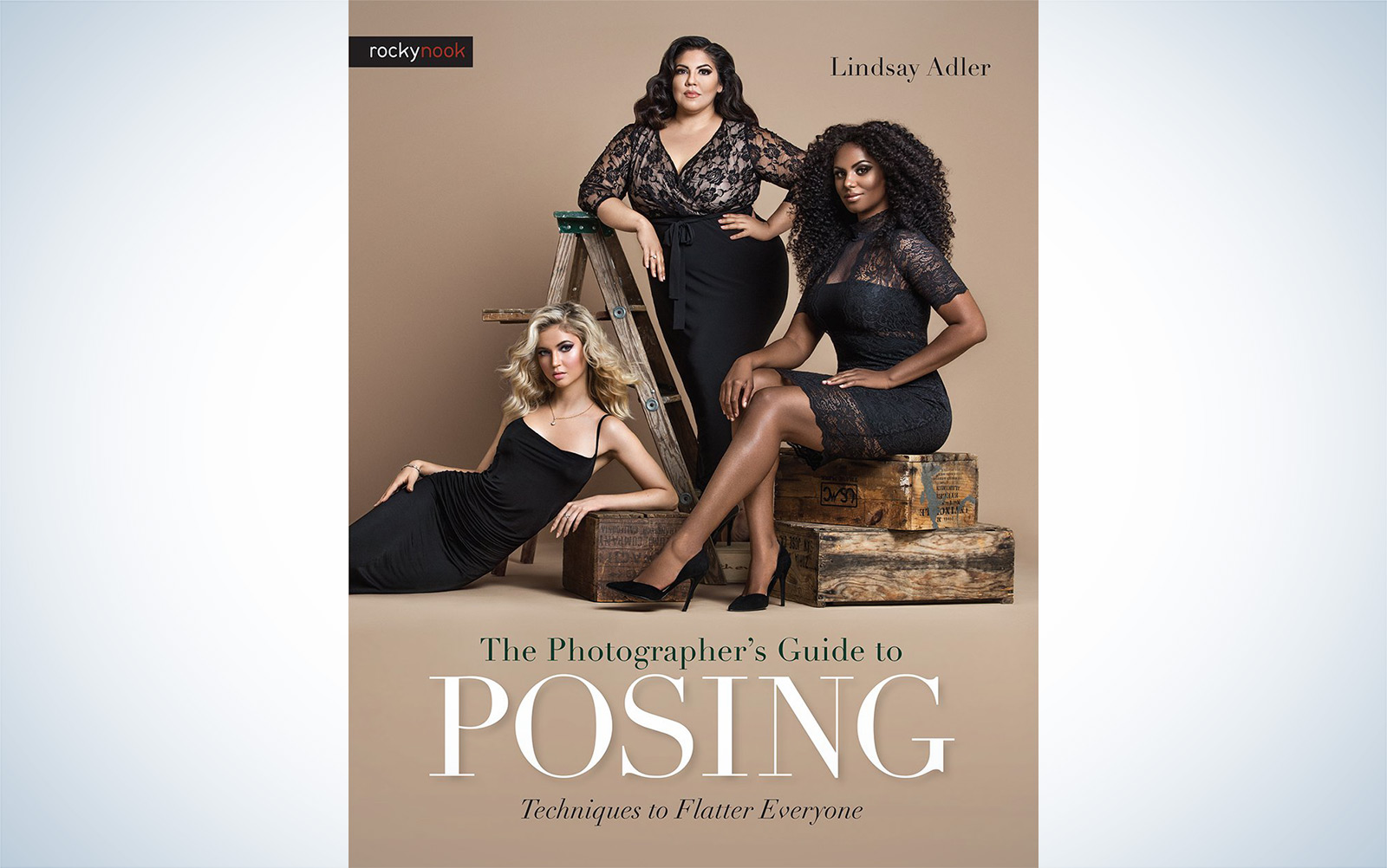 The cover of a photography book titled The Photographer’s Guide to Posing: Techniques to Flatter Everyone