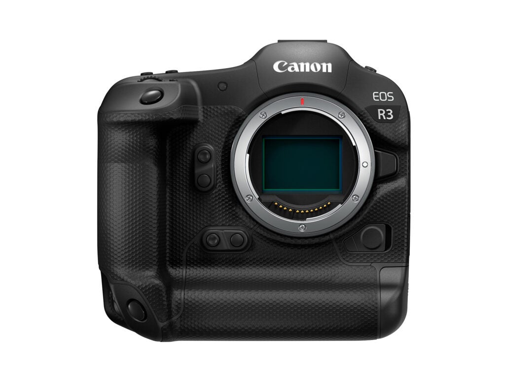 Canon EOS R3 with no lens on a white background