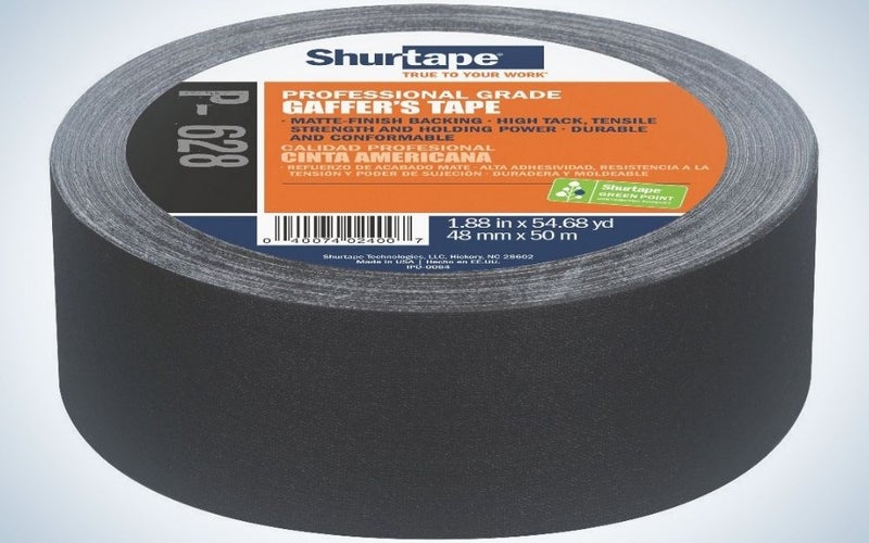 A thick black sticker with an orange inscription on top of it.