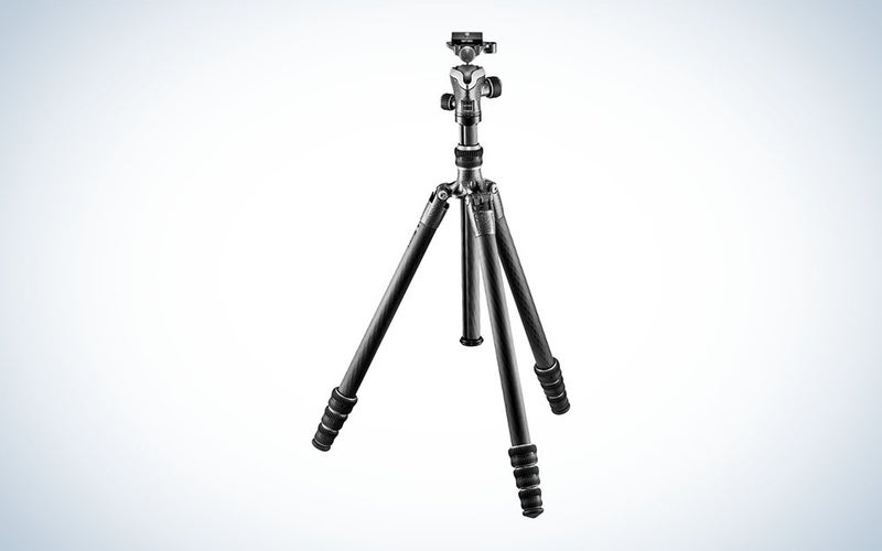 A carbon fiber tripod with three-section legs opened but not extended.