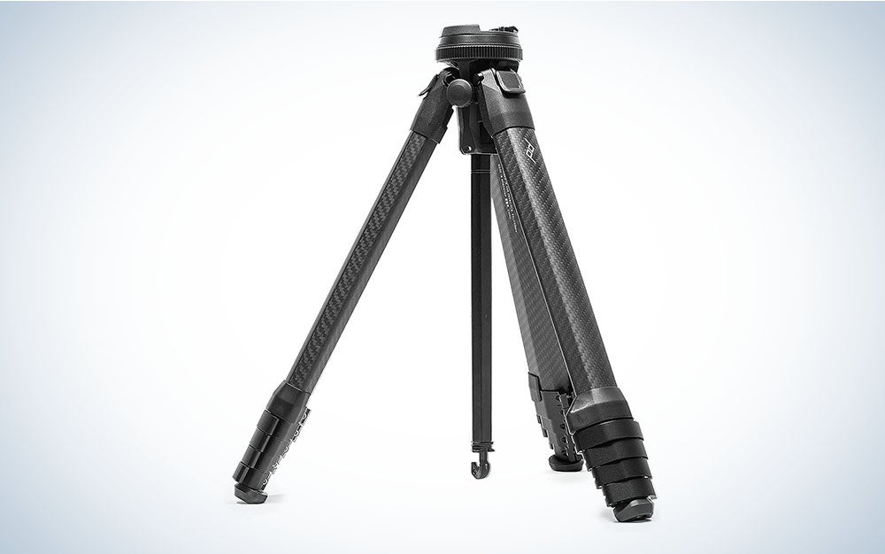 A carbon fiber travel tripod with the legs extended and weight hook down, ranked as the best travel tripod by us.