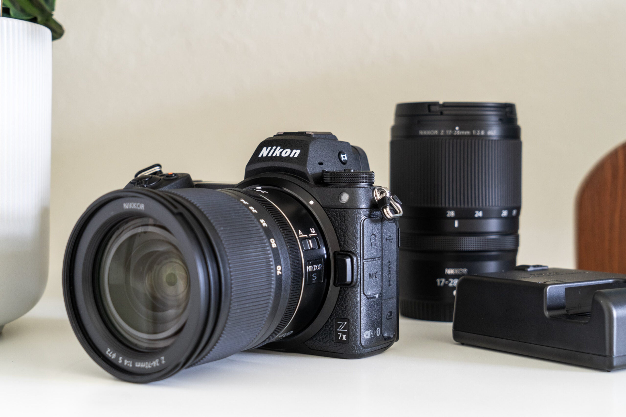 Nikon Z7 II mirrorless camera with lenses and battery charger.