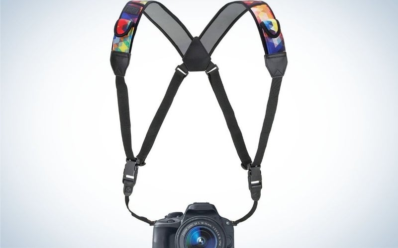 Camera strap chest harness with quick release buckles, geometric neoprene pattern, and accessory pockets