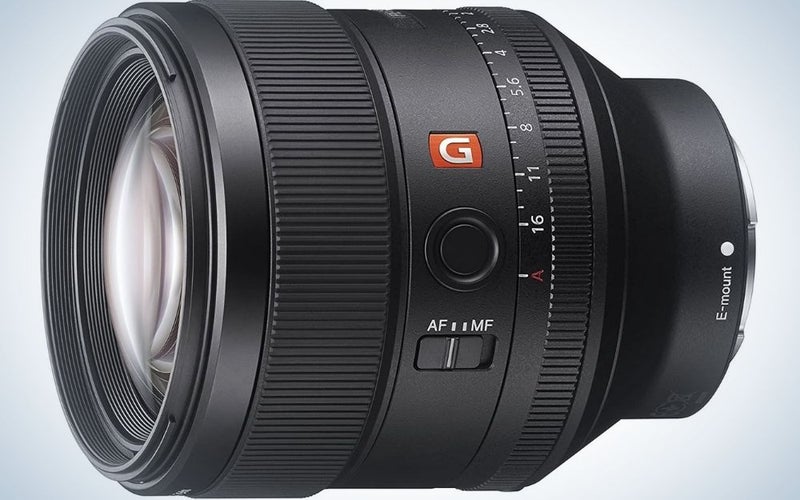 The lens of a professional camera positioned sideways and in a circular shape.