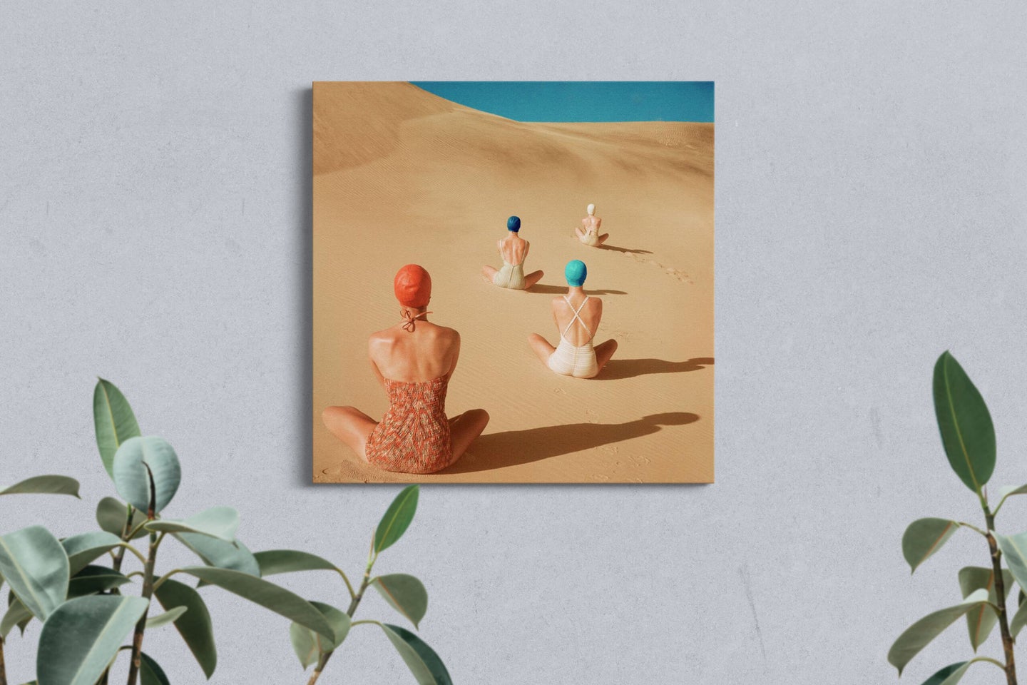 models-sitting-on-sand-dunes-canvas-on-wall