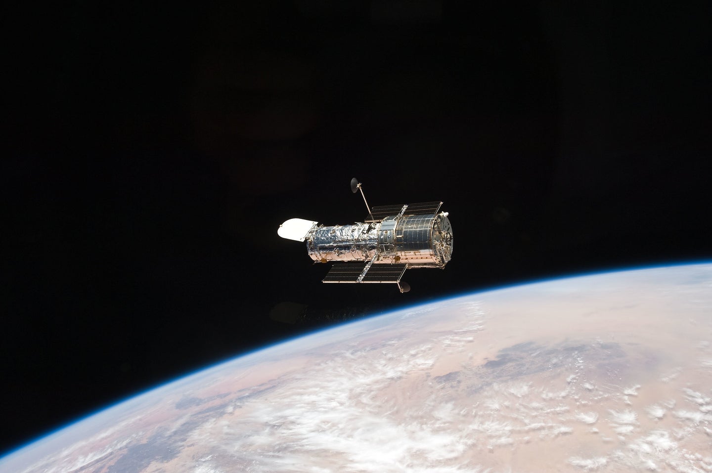 The Hubble telescope in orbit.