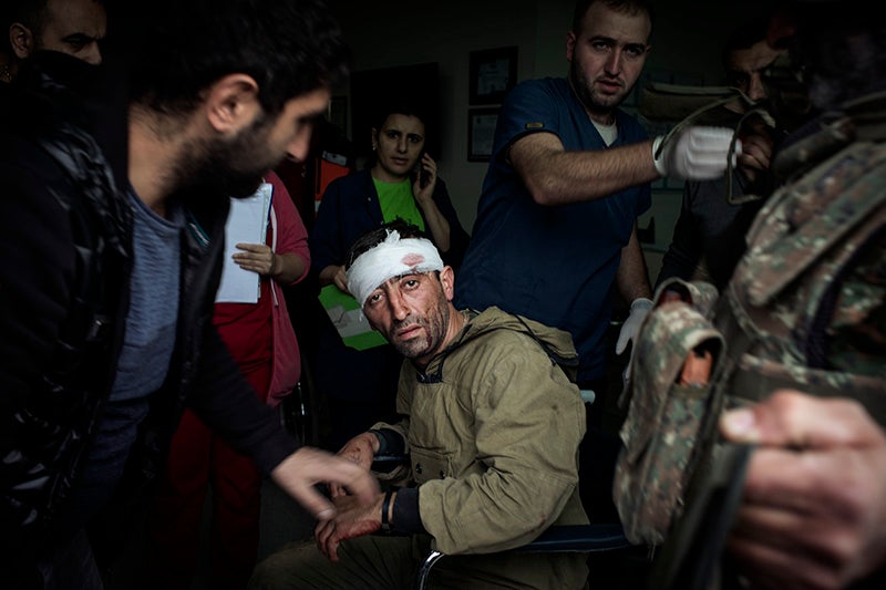 An Armenian combatant is admitted to the emergency department of Stepanakert hospital from the series "Conflict and Covid-19 in Nagorno-Karabakh".